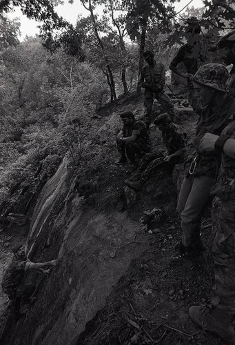 Claflin demonstrates rock climbing, Liberal, 1982