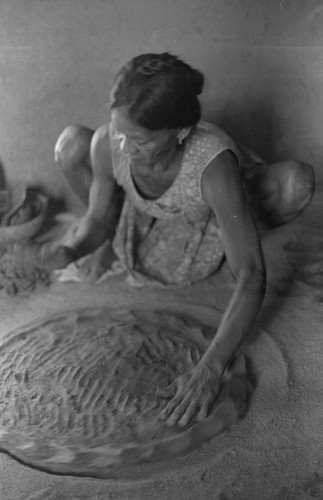 Woman making pottery, La Chamba, Colombia, 1975