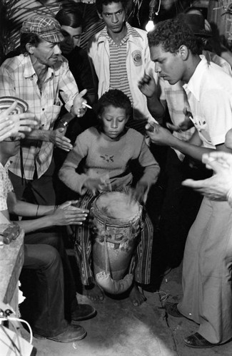 Boy playing the conga drum, Barranquilla, Colombia, 1977