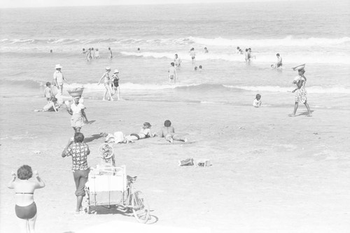 Woman selling fruit at the beach, Cartagena, ca. 1978