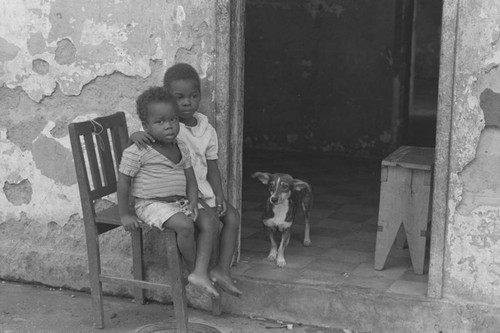 Two young boys and a dog, Barbacoas, Colombia, 1979