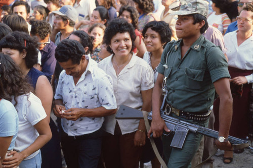 Crowd lining up at the polls to vote, Santa Tecla, El Salvador, 1982