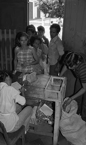 People wait in line for food rations, Nicaragua, 1979