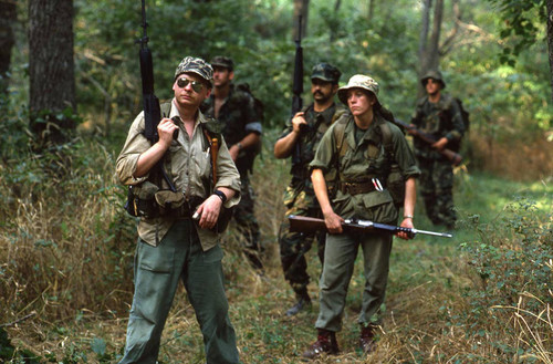 Survival school students participate in an obstacle course, Liberal, 1982