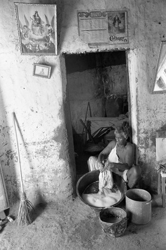 Woman washing clothes, San Basilio de Palenque, 1977