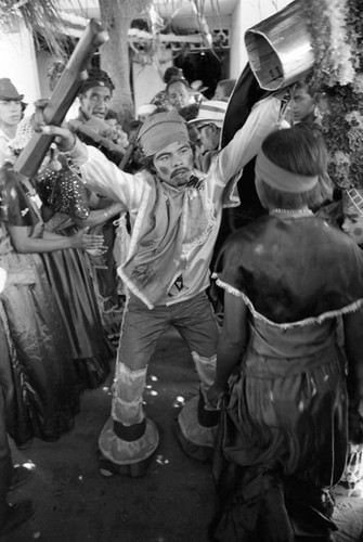 Young man and woman dancing among a crowd, Barranquilla, Colombia, 1977