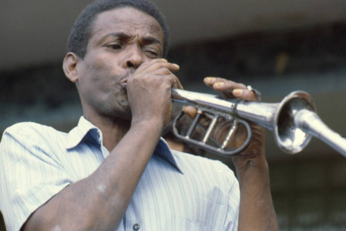 Man Playing the bugle at the Blacks and Whites Carnival, Nariño, Colombia, 1979