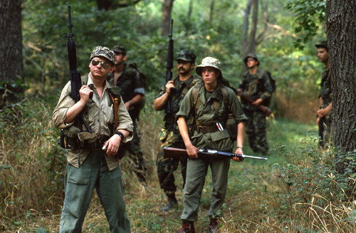 Survival school students participate in an obstacle course, Liberal, 1982