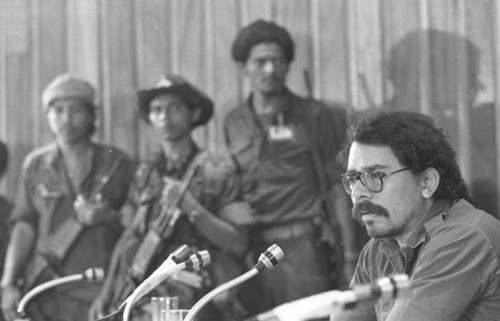 Sandinista official at a press conference, Nicaragua, 1979