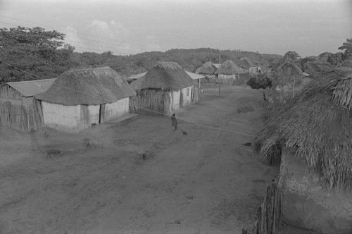 Woman sweeping the road, San Basilio de Palenque, 1976