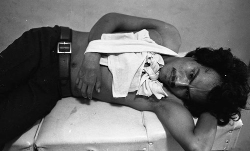 Injured man in high security prison, Nicaragua, 1980