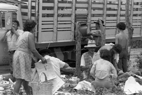 Wrapping clay pieces, La Chamba, Colombia, 1975