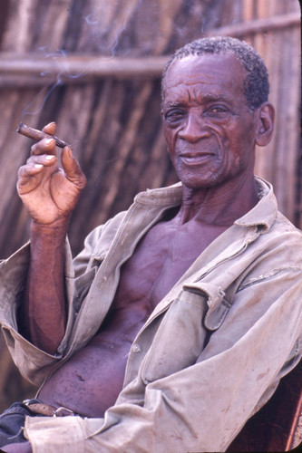 Man smoking a cigar, San Basilio de Palenque, 1976