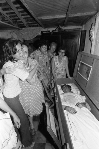 Women grieving near a coffin, Nicaragua, 1979