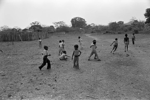 Boys playing in a dirt field, San Basilio de Palenque, 1977