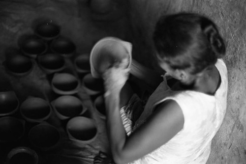 Artisan at work, La Chamba, Colombia, 1975