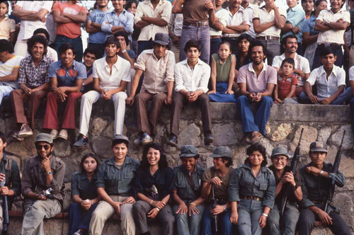Residents and guerrillas watching a performance, La Palma, 1983