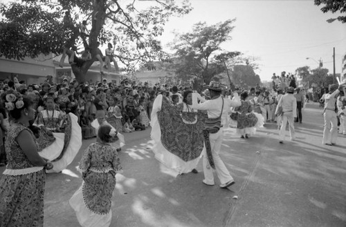 Dancers performing in the street, Barranquilla, Colombia, 1977