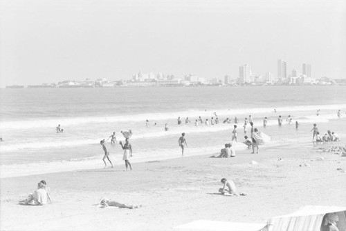 Woman selling fruit at the beach, Cartagena, ca. 1978