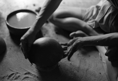 Artisan at work, La Chamba, Colombia, 1975