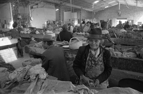 An old woman at the market, Tunjuelito, Colombia, 1977