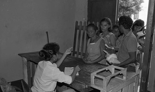 People wait in line for food rations, Nicaragua, 1979