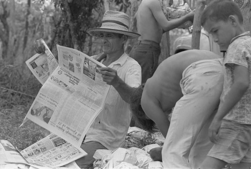 Wrapping clay pieces, La Chamba, Colombia, 1975