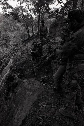 Claflin demonstrates rock climbing, Liberal, 1982