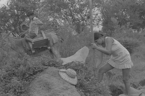 Woman extracting clay, La Chamba, Colombia, 1975