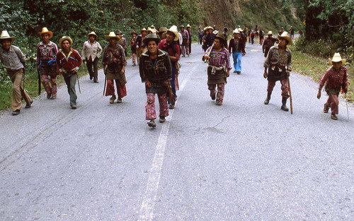 Mayan men walking on road, Chichicastenango, 1982