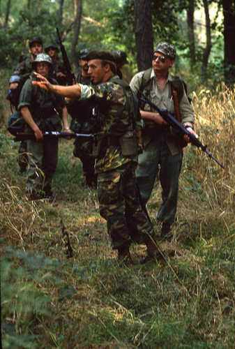 Survival school students participate in an obstacle course, Liberal, 1982