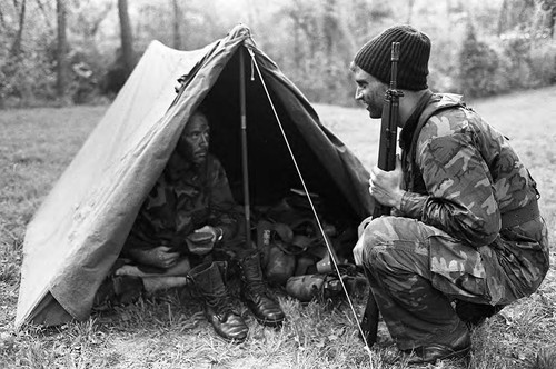 Survival school students near tents, Liberal, 1982