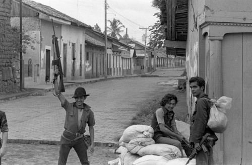 Armed Sandinistas in street, Nicaragua, 1979