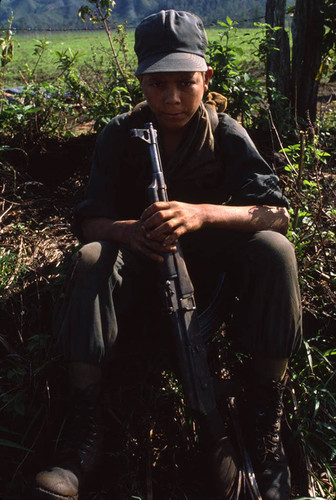 A child soldier and his rifle, Nicaragua, 1983