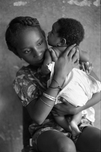 Girl holding a baby, San Basilio de Palenque, 1977