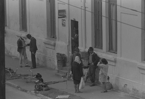 A group of men and women socializing, Bogotá, Colombia, 1976