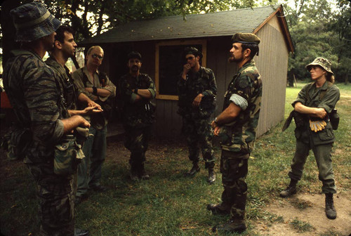 Survival school students await instructions, Liberal, 1982