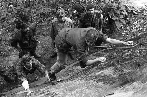 Survival school students learn to rock climb, Liberal, 1982