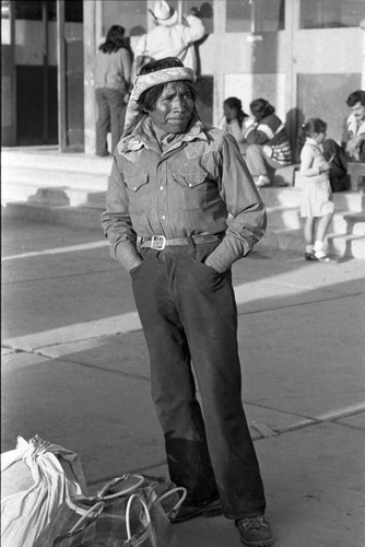 Rarámuri or Tarahumara indigenous man waits for a train, Cuidad Juarez, 1983