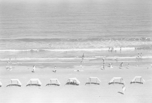 Woman selling fruit at the beach, Cartagena, ca. 1978