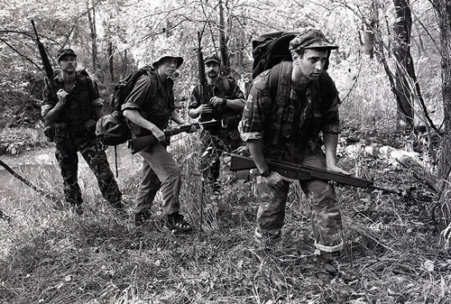 Survival school students participate in an obstacle course training, Liberal, 1982