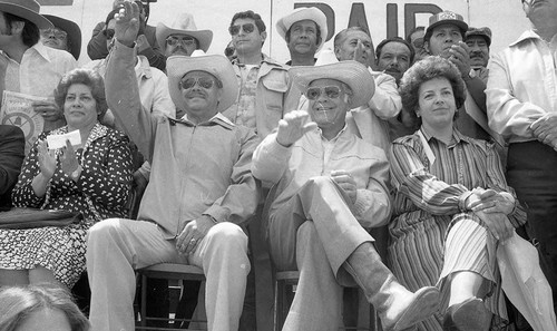 Presidential candidate Ángel Aníbal Guevara and his running mate Ramiro Ponce Monroy salute the crowd, Guatemala City, 1982