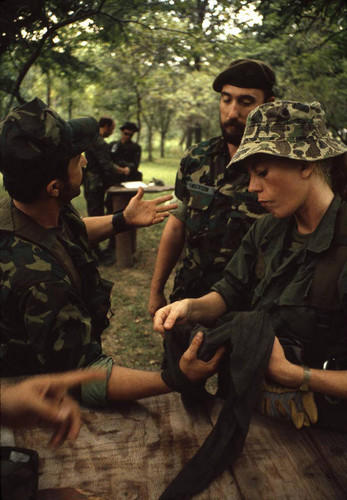 Survival school students learn first aid techniques, Liberal, 1982