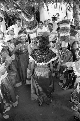 Dancers dancing among a crowd, Barranquilla, Colombia, 1977