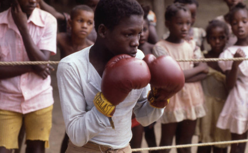 Boxer fighting inside ring, San Basilio de Palenque, 1976