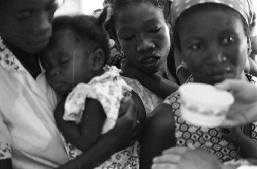 Child being baptized, San Basilio de Palenque, 1975