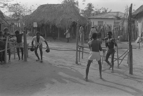 Boxers fighting inside ring, San Basilio de Palenque, ca. 1978