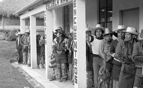 Mayan men waiting in line to vote, Guatemala City, 1982