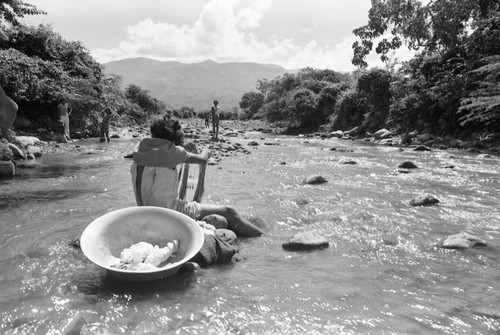 Woman washing in river, La Guajira, Colombia, 1976