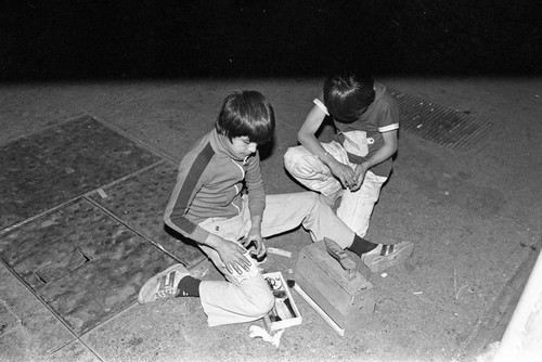 Two boys and shoe shine supplies, Mexico City, 1982